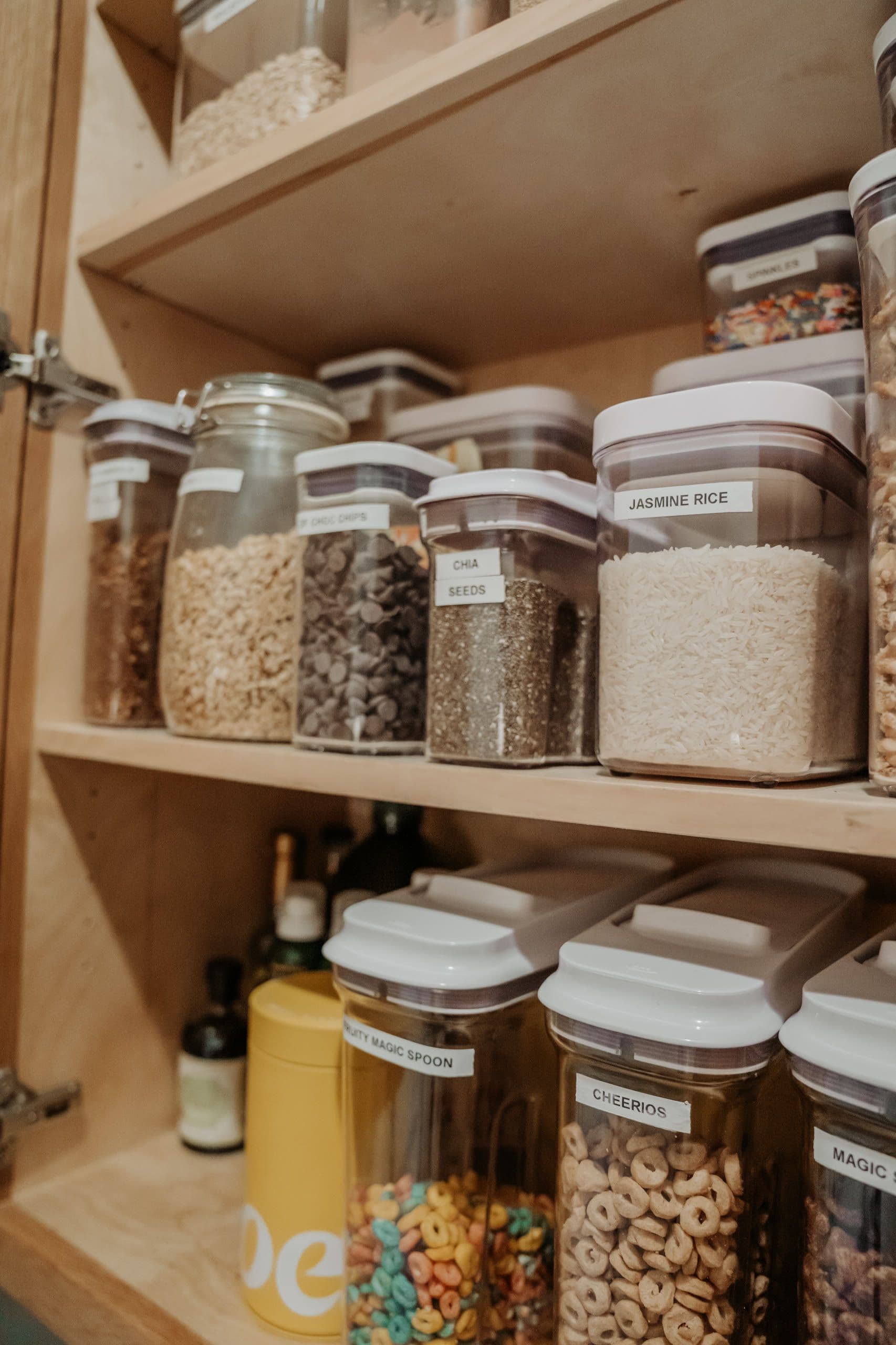 A pantry with labeled canisters